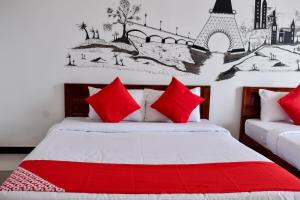 Voodi või voodid majutusasutuse Mallika Resort toas