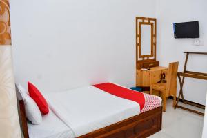 Voodi või voodid majutusasutuse Mallika Resort toas