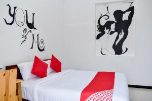 Voodi või voodid majutusasutuse Mallika Resort toas