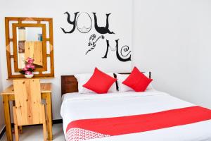 Voodi või voodid majutusasutuse Mallika Resort toas
