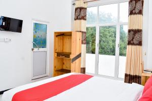 Voodi või voodid majutusasutuse Mallika Resort toas