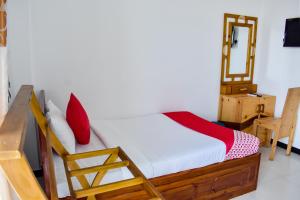 Voodi või voodid majutusasutuse Mallika Resort toas