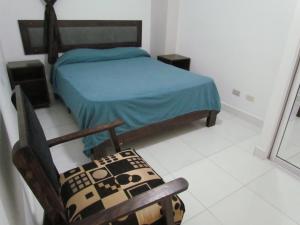 Postel nebo postele na pokoji v ubytování Plaza Coral Hotel