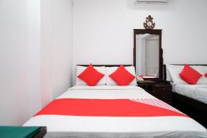 Shirantha Hotel客房内的一张或多张床位