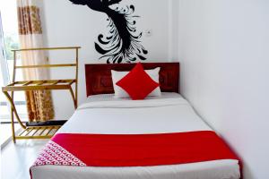 Voodi või voodid majutusasutuse Mallika Resort toas