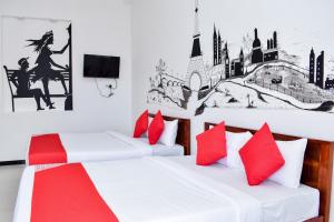 Voodi või voodid majutusasutuse Mallika Resort toas