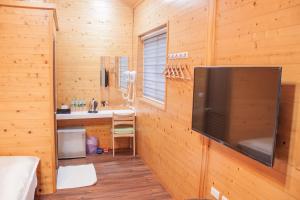 TV a/nebo společenská místnost v ubytování Yellow Mountain Homestay + 32 fotografií