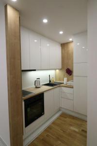 Η κουζίνα ή μικρή κουζίνα στο Tajriks