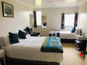 Postel nebo postele na pokoji v ubytování Hokitika - Blue Spur Bed and Breakfast
