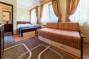 Postel nebo postele na pokoji v ubytování Apartments&Camping ZIP