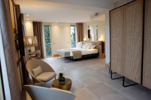 Postel nebo postele na pokoji v ubytování Splendid Hôtel & Spa