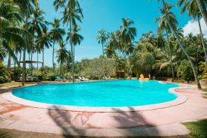 Bazén v ubytování Eva Lanka Hotel - Beach & Wellness nebo v jeho okolí
