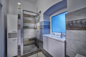 Kúpeľňa v ubytovaní Apartmán BB centrum + 37 fotografií