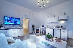 Kuchyňa alebo kuchynka v ubytovaní Apartmán BB centrum