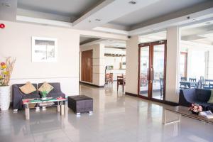 Posezení v ubytování Negrense Suites
