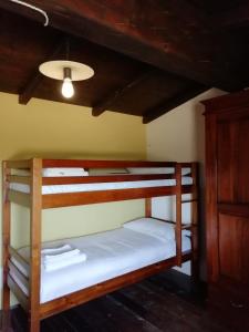 En eller flere senge i et værelse på B&B Badde Cubas