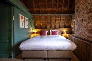 Postel nebo postele na pokoji v ubytování Hotel Beijers