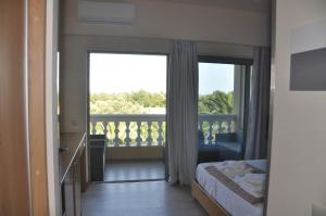 Postel nebo postele na pokoji v ubytování Fiori Hotel