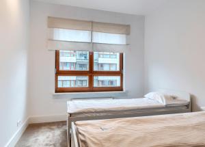 Posteľ alebo postele v izbe v ubytovaní Imperial Apartments Aquarius V