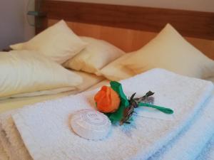 Postel nebo postele na pokoji v ubytování Penzión KOVOX