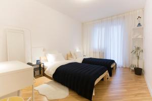 Postel nebo postele na pokoji v ubytování apt.vrbik