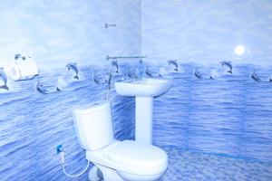 Koupelna v ubytování Subash Hotel