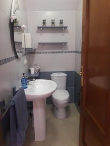 Phòng tắm tại Vivienda Turística Ronda del Carmen