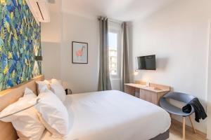 Postel nebo postele na pokoji v ubytování Hotel Aria