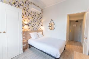 Postel nebo postele na pokoji v ubytování Hotel Aria