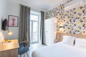 Postel nebo postele na pokoji v ubytování Hotel Aria