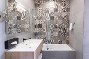 Koupelna v ubytování Hotel Aria