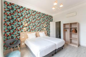 Postel nebo postele na pokoji v ubytování Hotel Aria