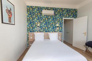 Postel nebo postele na pokoji v ubytování Hotel Aria
