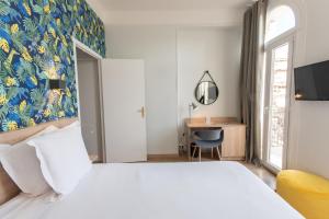 Postel nebo postele na pokoji v ubytování Hotel Aria