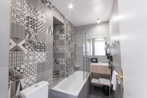 Koupelna v ubytování Hotel Aria