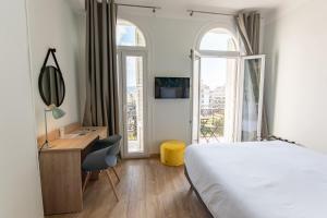 Postel nebo postele na pokoji v ubytování Hotel Aria