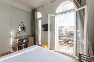 Postel nebo postele na pokoji v ubytování Hotel Aria