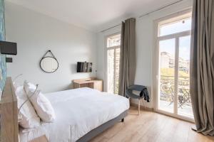 Postel nebo postele na pokoji v ubytování Hotel Aria