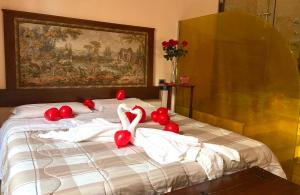 Postel nebo postele na pokoji v ubytování Vogue Hotel Arezzo