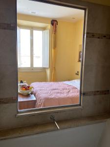 Postel nebo postele na pokoji v ubytování Vogue Hotel Arezzo