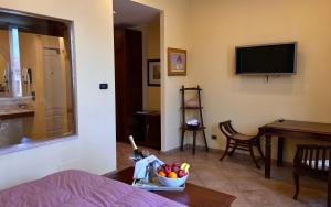 TV a/nebo společenská místnost v ubytování Vogue Hotel Arezzo