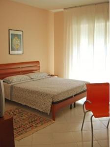 Ліжко або ліжка в номері Costapicca
