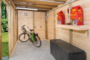 a bike is parked in a wooden shed at Remsfass in Schwäbisch Gmünd