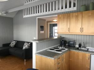 Кухня или кухненски бокс в Sólbakki Holiday Home