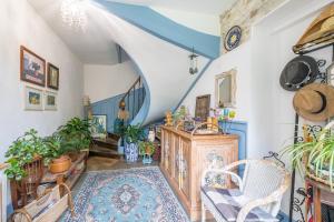 Zona de estar de Appart'Hôtel Bellevue