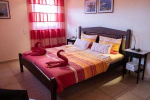 A bed or beds in a room at Finca Estrella Még 14 kép