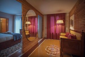 Postel nebo postele na pokoji v ubytování Cinqueteste Luxury Home