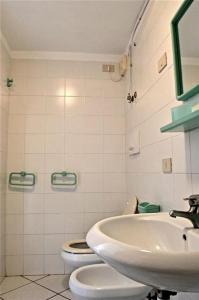 Phòng tắm tại Appartamenti Le Fornaci