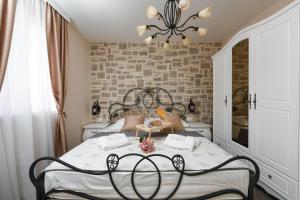 Postel nebo postele na pokoji v ubytování Villa Imperia ZadarVillas