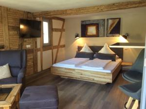 Postel nebo postele na pokoji v ubytování Schmuckkästle am Hafen